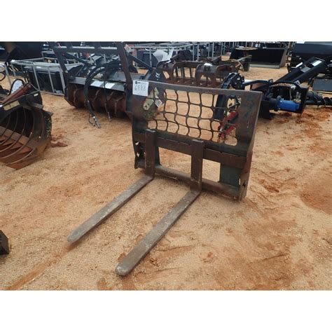 bobcat skid steer fork attachment|bobcat skid steer tiller attachment.